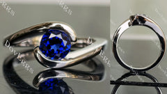 Ocean Wave round solitaire intense royal blue sapphire colored gem engagement ring