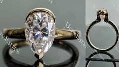 Kindal Dovie Doutch Marquise cut solitaire moissanite engagement ring