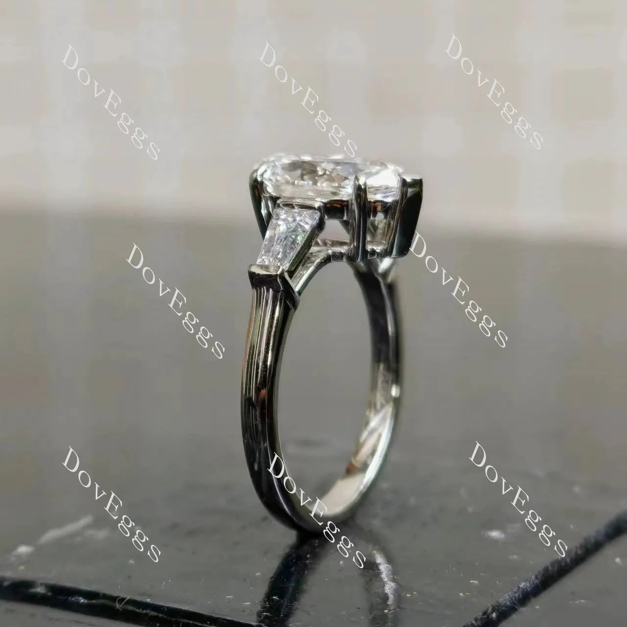 The Maddox-Pear three stones moissanite engagement ring| DovEggs