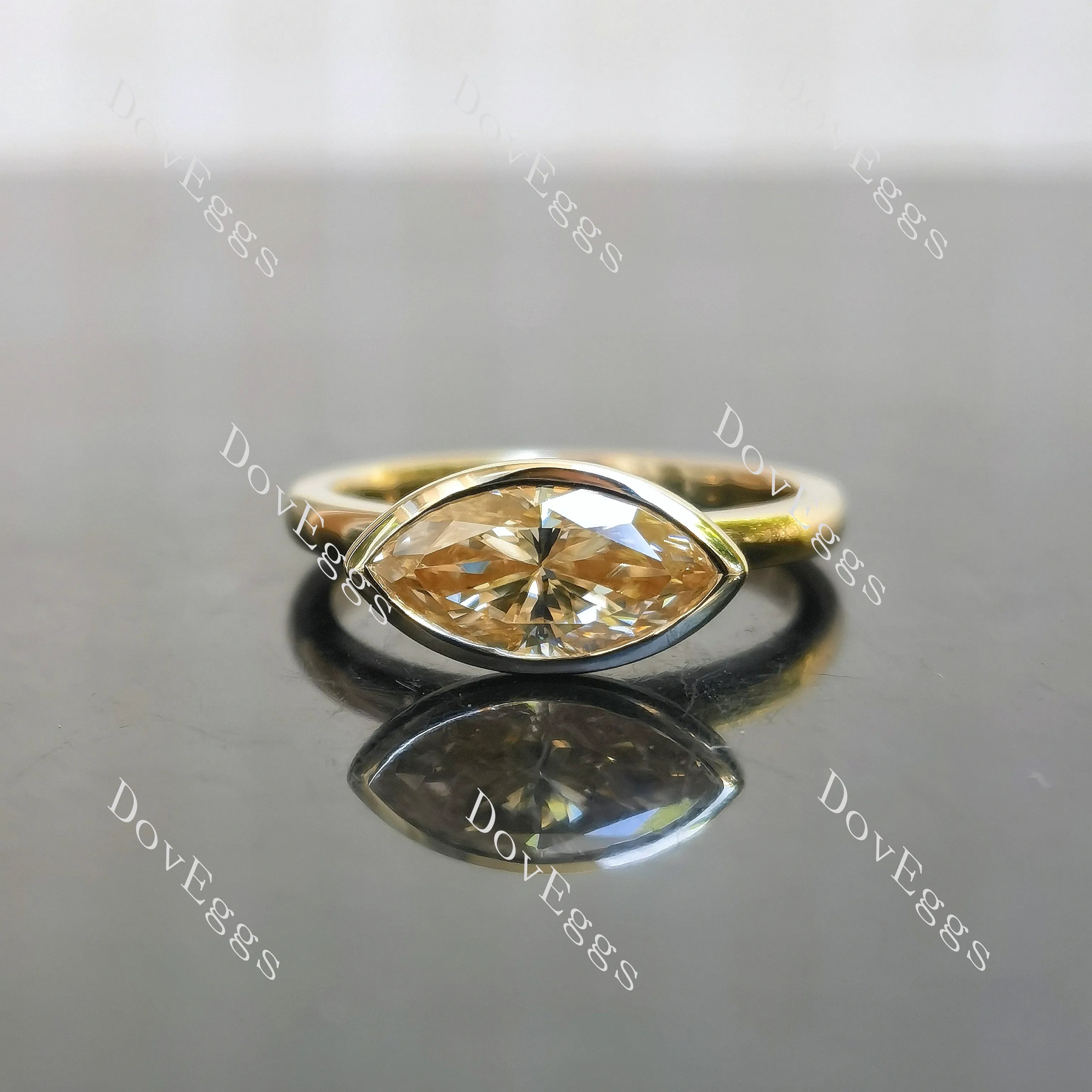 East-West marquise bezel solitaire moissanite engagement ring| DovEggs