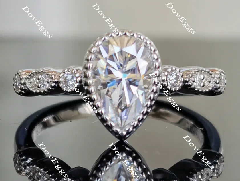 doveggs pear side stone moissanite engagement ring