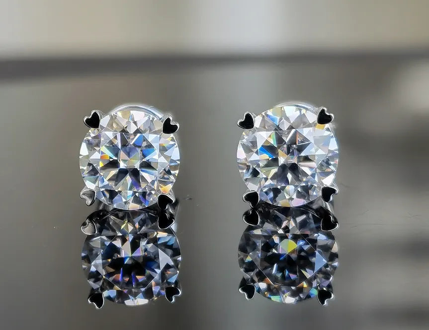 DovEggs solitaire round moissanite stud earring